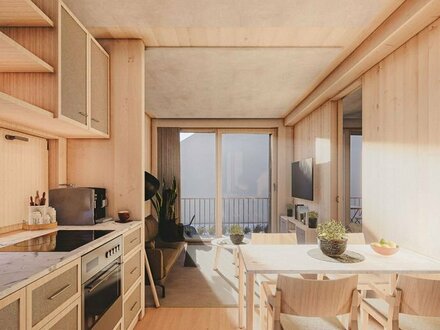 Voll Holz: Moderne Gartenwohnung in einzigartigem Vollholzhaus mit Tageslicht-Badezimmer und offenem Wohnkonzept