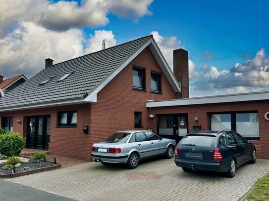 Familienhaus mit Einliegerwohnung in Loruper Siedlung!