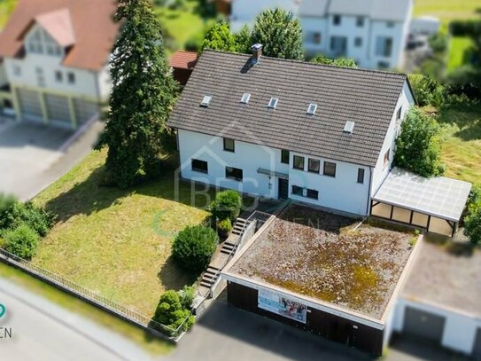 Stadtnahes Einfamilienhaus mit Einliegerwohnung und Gartenidylle