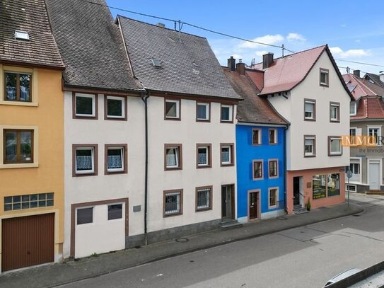 IMMORath.de - Charmantes Mehrfamilienhaus mit zwei Terrassen