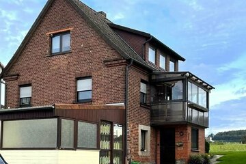 METEOR IMMOBILIEN : Schöne kleindörfliche Lage mit herrlichem, weitem Blick