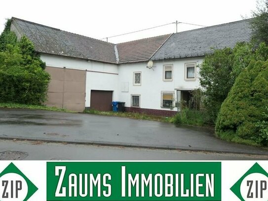 Einfamilienhaus mit Garage und angebauten Nebengebäude