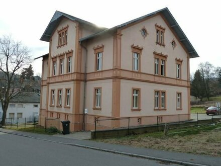 Mehrfamilienhaus mit Garten und Stellplätzen