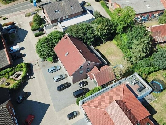 Einfamilienhaus mit Gewerbeeinheit im Erdgeschoss