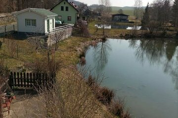 Teichgrundstück mit Bungalow mit Kalksandstein-Mauerwerk