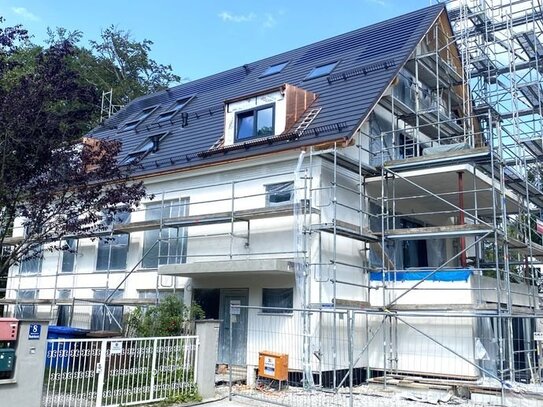 Neubau // Hochkarätige Wohnung im Obergeschoß in München Harlaching