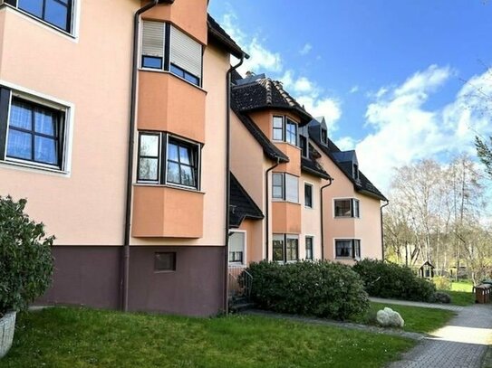 129.900 für nicht alltägliche Wohnung mit Küche + wettergeschützter Balkon + behaglicher Heizkamin