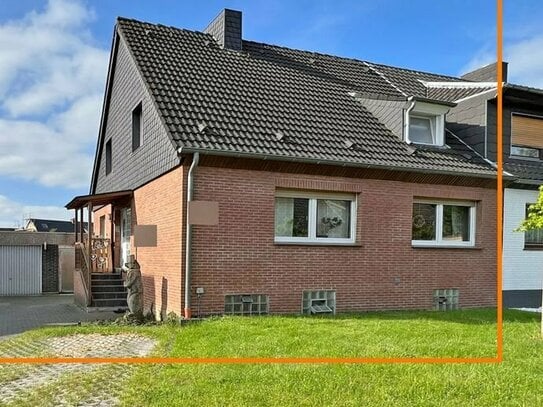 Viele Möglichkeiten: Traumhaftes Zweifamilienhaus in Voerde - Wohnen mit Stil und Potenzial!