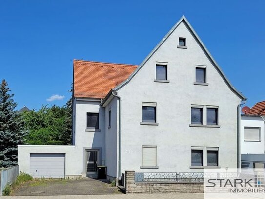 Wohnraum oder Gewerbe? Top zentrale Lage in Höchbergs Hauptstraße - Mehrfamilienhaus mit Garage!