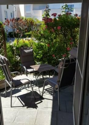 2Zi Wohnung mit traumhafter Terrasse und Rosengarten