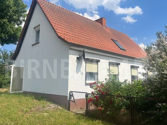 Grundstück mit Einfamilienhaus in Wassernähe