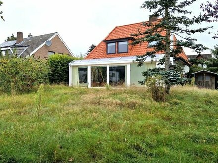 Kleines Raumwunder in Rastede: Familiengerechtes Einfamilienhaus mit tollem Gartengrundstück!