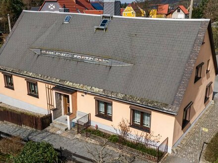 Potentialreiches Einfamilienhaus in Steinigtwolmsdorf mit Garage und Garten
