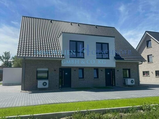 Moderne und energieeffiziente Doppelhaushälfte mit Ausbaureserve im Dachgeschoss in naturnaher Lage von Schapen!