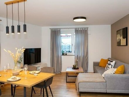 Neubau: Sonnige 3-Zimmerwohnung mit Balkon, modernem Bad - neue EBK inklusive