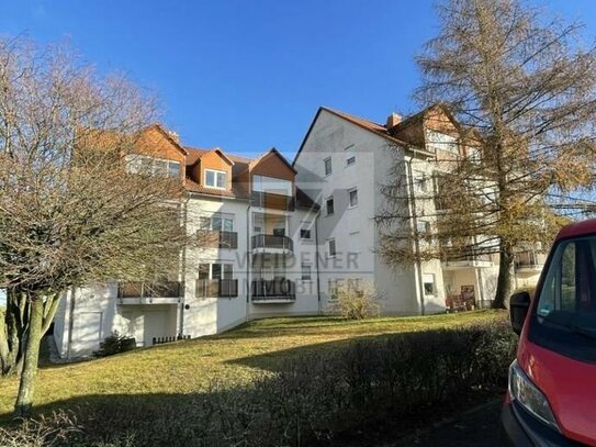 Interessante Investitionsmöglichkeit: Vermietete 2-Zimmer-Wohnung mit Balkon und Carport