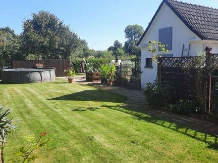 "Viel Platz zum Wohlfühlen!" Charmantes Einfamilienhaus mit moderner Einbauküche, Traumgarten, Außenpool und Carport