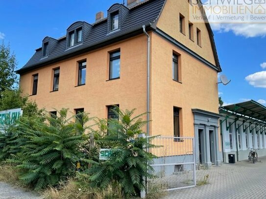 Mehrfamilienhaus und Gewerbehalle in sehr guter Lage