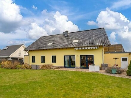 Barrierefreie Eigentumswohnung mit großem Garten, Carport in KFW 40 Haus