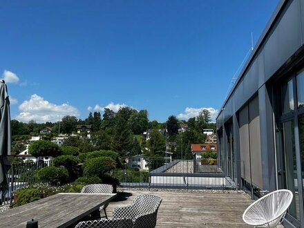 Residieren im Four Site: Exklusives Penthousebüro mit See- und Gebirgsblick in bester Lage