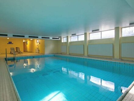 Exklusive 2-Zi-Wohnung mit großem Südbalkon, Swimmingpool & Sauna!