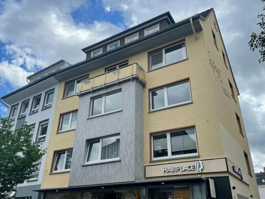 Renditeträchtige Kapitalanlage: Äußerst gepflegtes Wohn- und Geschäftshaus in bester Innenstadtlage, Neuenweg 4, Gi...