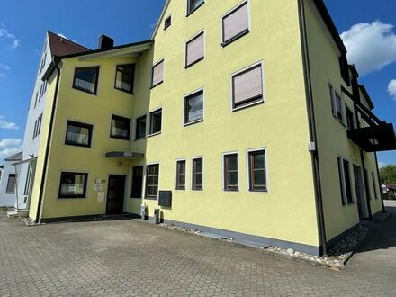 Vermietete Eigentumswohnung in Wohn- und Geschäftshaus in Berg