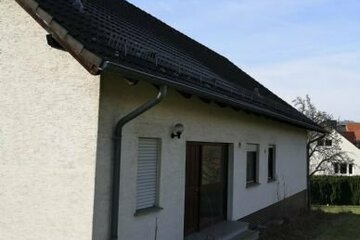 Hier wohnen Sie in außergewöhnlicher Architektur in Südhanglage von Schauenburg-Elgershausen mit unverbaubarem Fernblick