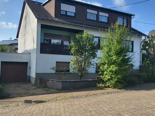 Ein- Zweifamilienhaus in Herold mit 3 Garagen, kleiner Werkstatt und großem Garten zu verkaufen