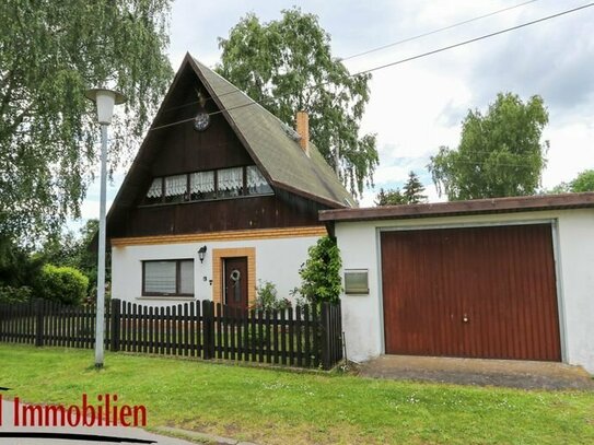 Einfamilienhaus in idyllischer Feldrandlage mit großem Grundstück und Ferienbungalow