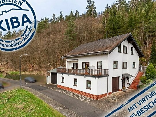 Ortsrandlage im ruhigen Arbach: Einfamilienhaus mit Sonnenterrasse und direktem Waldzugang