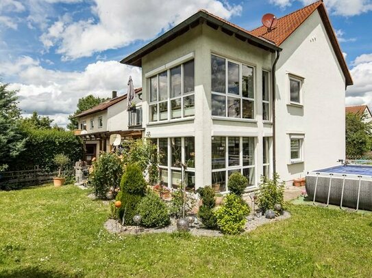 3-Familienhaus in idyllischer Lage von Baiersdorf-Igelsdorf mit zwei Wintergärten