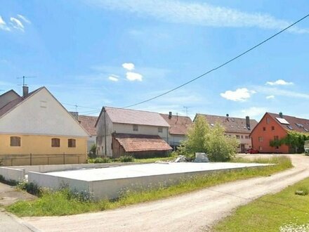 Exklusive Kapitalanlage - Großes Mehrfamilienhaus mit integriertem Supermarkt und Bauplatz