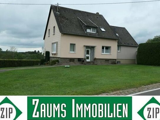 Zweifamilienhaus mit Anbau (3 Wohneinheiten/z.Zt. alle vermietet) in Randlage mit unverbaubarer Fernsicht