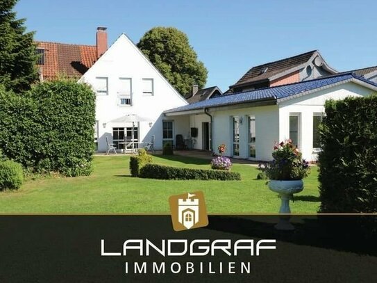 Einziehen & Wohlfühlen - besonderes Ein/ -Zweifamilienhaus mit wunderbarem Garten in zentraler-Lage!