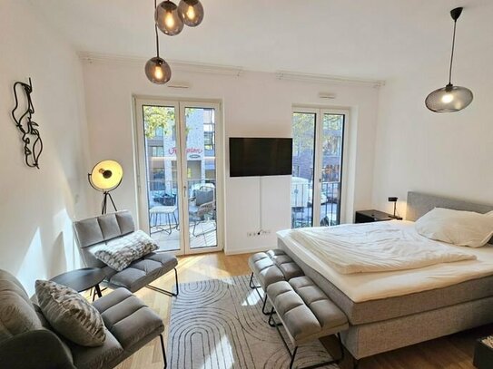 Neubau 2020! - Ab 15.10.24 - Schick möbliertes 1-Zimmer Apartment mit Balkon & Parkettboden- zentr. Ostend Lage