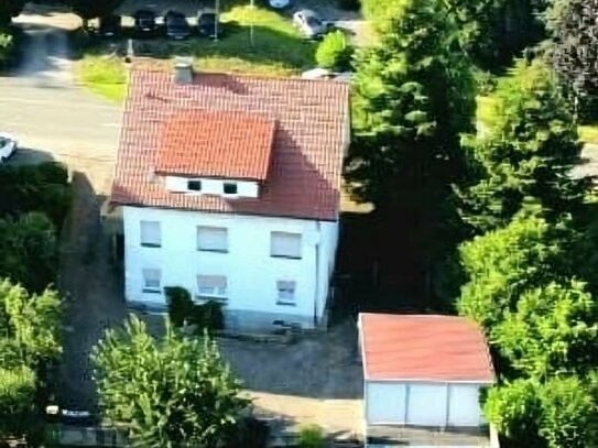 Eine Investition für die Zukunft in Hüllhorst / Oberbauerschaft. 2-3 Familienhaus in Südlage mit Ausbaureserven am Rand…