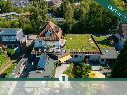 Modernes Mehrfamilienhaus mit 5 Parteien in Ostseenähe mit Doppelgarage, großem Garten und Badeteich