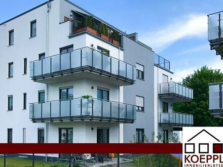 Kapitalanlage! Vermietete Erdgeschosswohnung mit Terrasse, Garten + Garage, moderne Wohnanlage