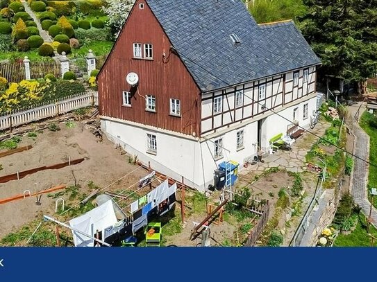 "Historischer Charme zum Leben erwecken: Denkmalgeschütztes Fachwerkhaus mit Renovierungsbedarf"
