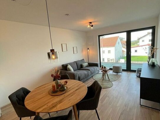 Neubau: hochwertige 2-Zimmer Wohnung im EG mit Terrasse, Garten und Einbauküche ( Ref. 0.02)