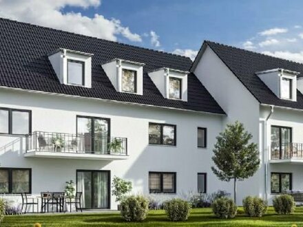 Lebhafte, im 2022 gebaute 2-Zimmer-Wohnung mit EBK, Terrasse/Garten und Stellplatz