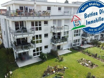 DIETZ: Neuwertige 4-Zimmer-Wohnung mit Balkon, Kaminofen, TG-Stellplatz - Am Fechenheimer Wald!