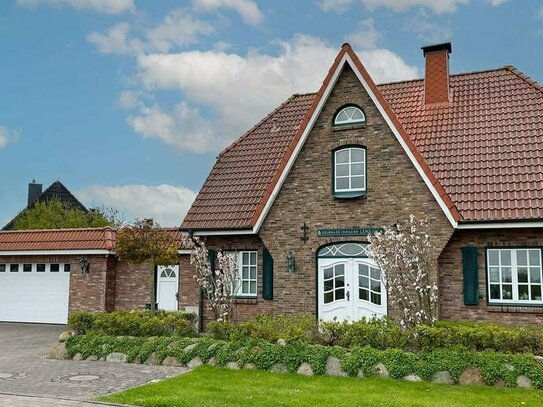 Stinteck: Traumhaftes Einfamilienhaus mit großer Terrasse und schickem Kamin in Deichnähe