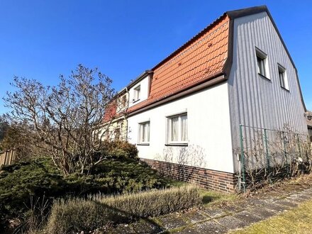 Berkenbrück-Doppelhaushälfte mit Nebengebäude und Garage