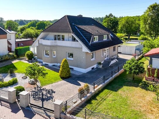 Strandnahes Einfamilienhaus mit Einliegerwohnung und traumhaften parkähnlichen Grundstück in Scharbeutz OT Haffkrug