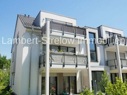 Wiesbaden-Biebrich, Neuwertige Dachgeschosswohnung mit Dachloggia, Einbauküche und Tiefgaragenplatz