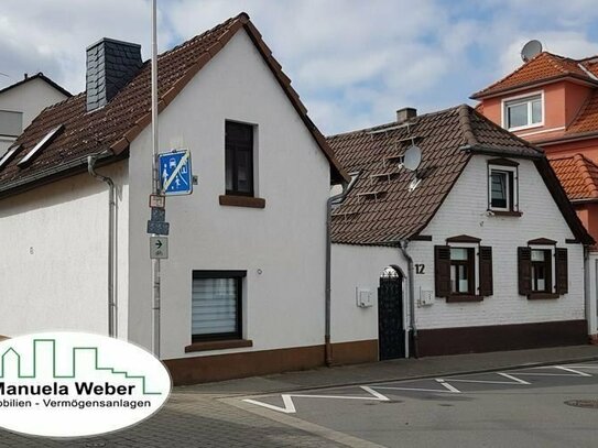 Vermietetes kleines Einfamilienhaus mit leerem Nebengebäude und Freisitz im Herzen von Rodgau-Jügesheim
