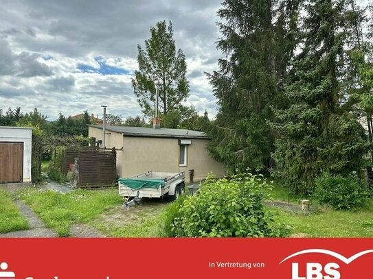 Rarität: Grundstück mit Bungalow für Neubau