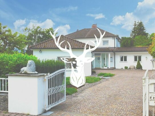 Elegante Villa mit einem unvergleichlichen Rheinblick und Baulandreserve in Dogern zu verkaufen